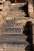 The great Chola temples of Tamil Nadu - The Airavatesvara temple of Darasuram. Detail of the stairway of the  N-W corner of the prakara-wall. 